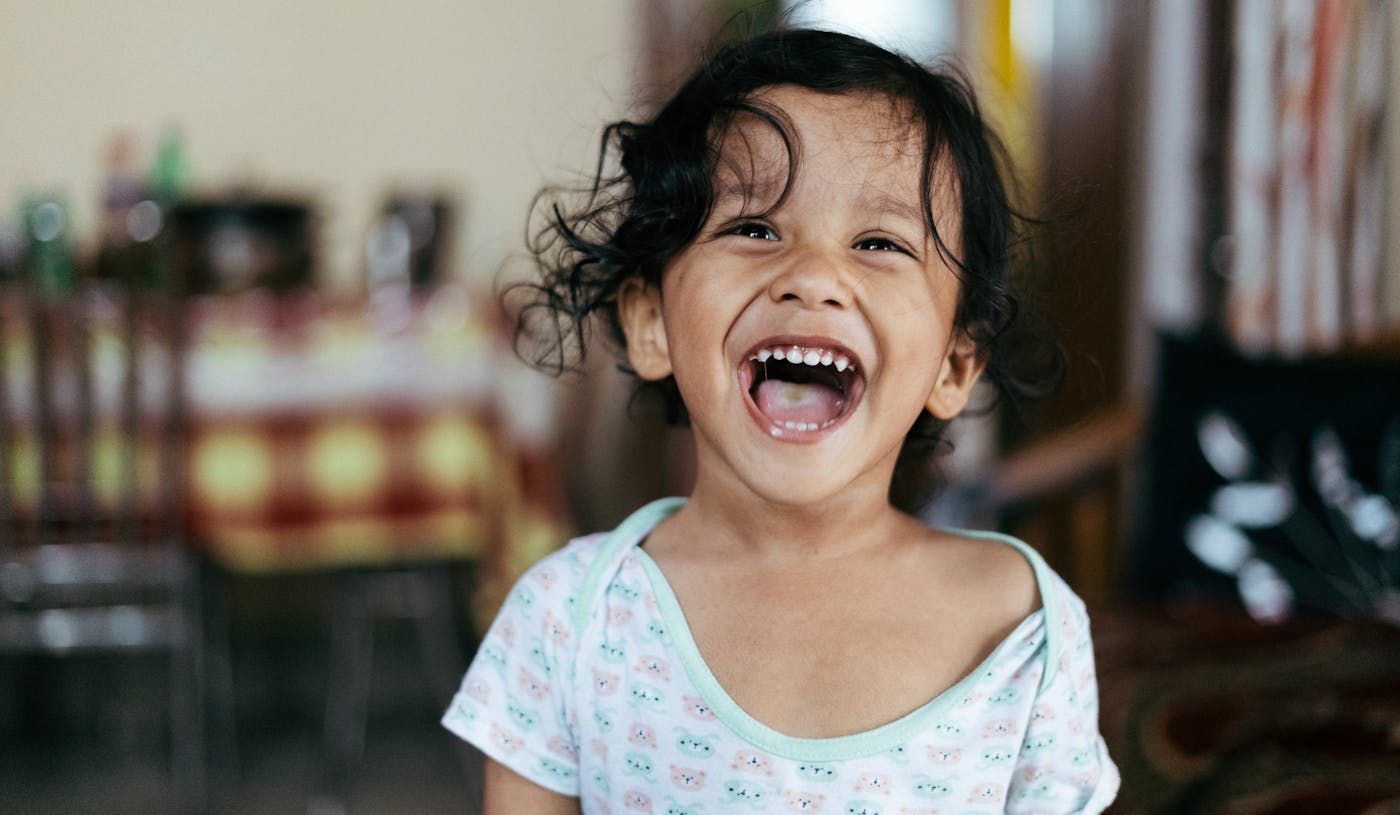 Happy laughing child at Native Chiropractic Oklahoma City