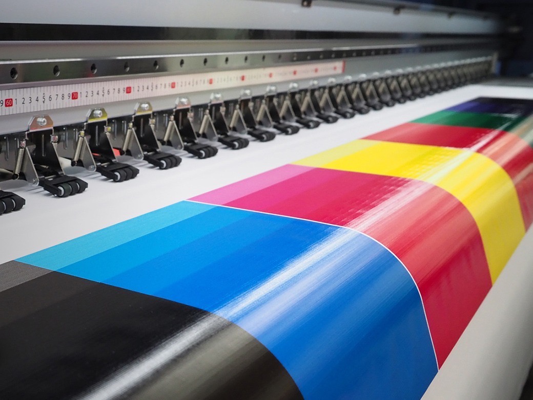 Wide-format printer producing vivid full-color prints at Special Vinyls Unit